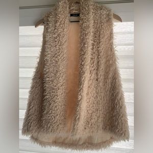 Oversized furry vest